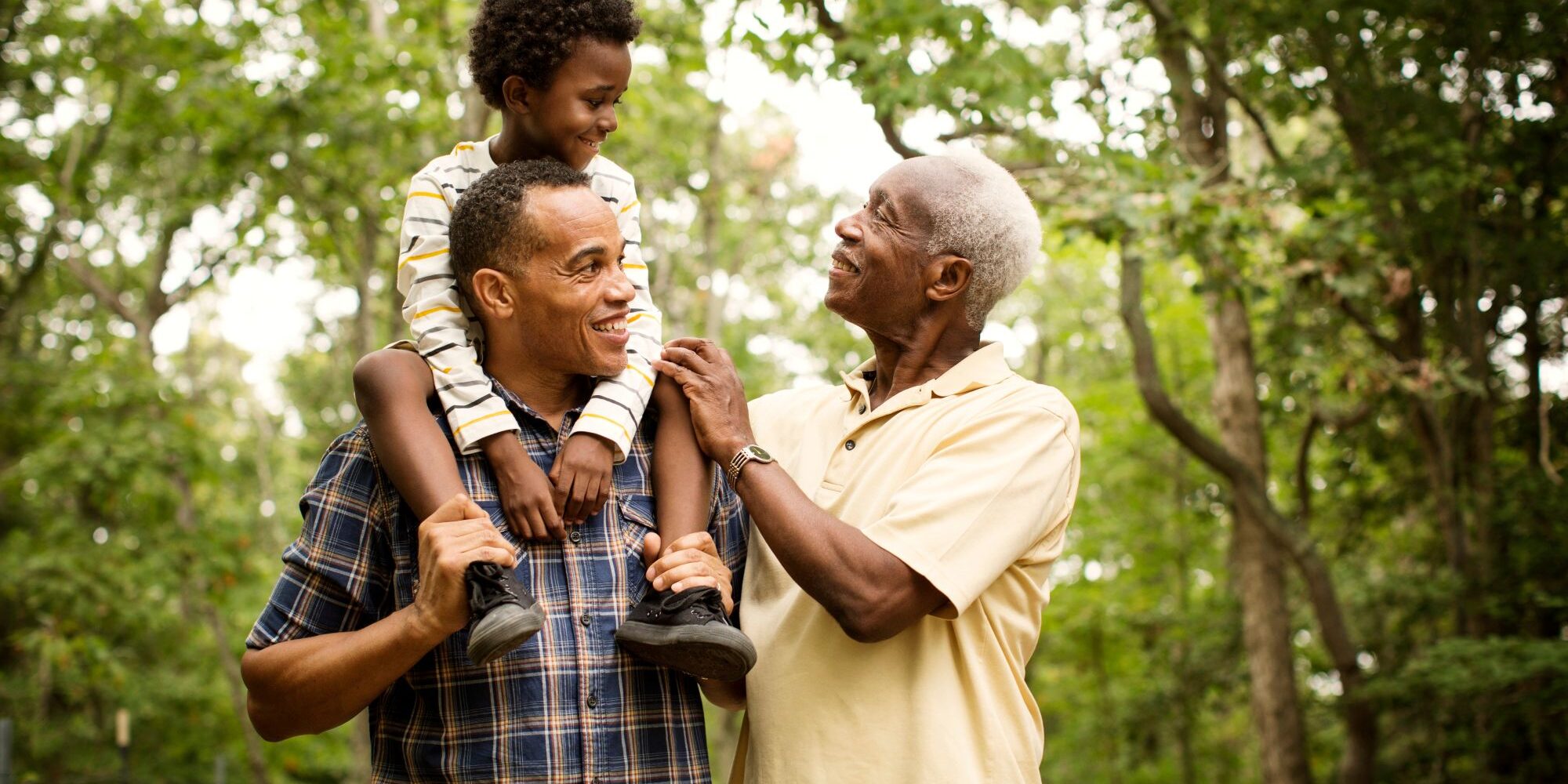 multi generational family in woods