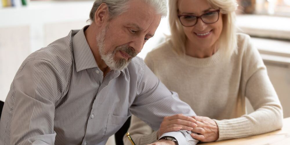 older couple looking at documents
